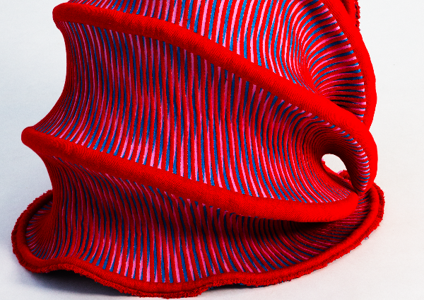 pleat it! exploring the potential of satin pleats to create changeability in woven textiles